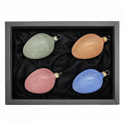 4 Ostereier aus Glas in einem transparenten Grün, Orange, Rot und Blau mit Glitzer überzogen und 6cm Durchmesser in einem schwarzen Naturkarton